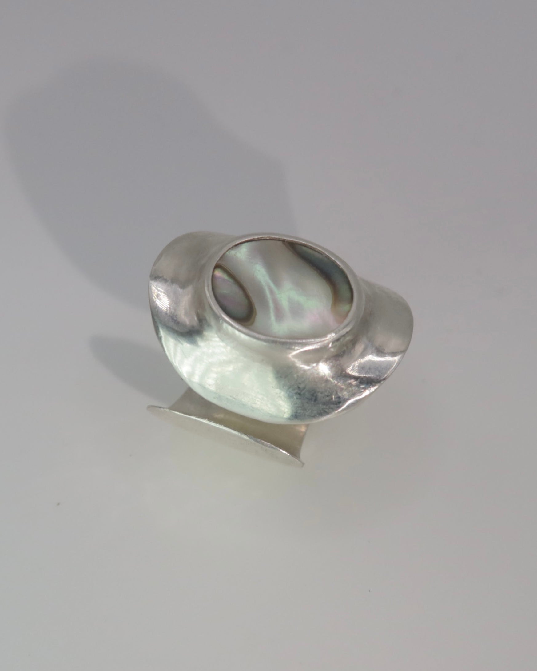 Silver ring  on a gray background